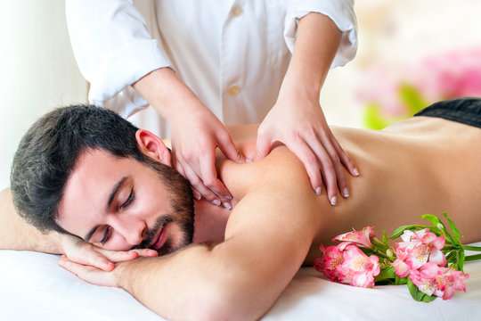 Man receiving a relaxing back massage.