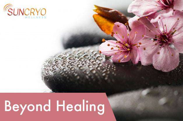 Pink flowers on wet stones: beyond healing.